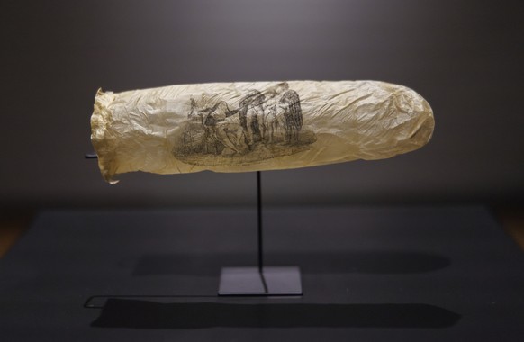 EDS NOTE: NUDITY - This image made available by the Rijksmueum shows a condom with print, circa 1830, which has gone on display at Amsterdam&#039;s Rijksmuseum. (Kelly Schenk/Rijksmuseum via AP)
Nethe ...