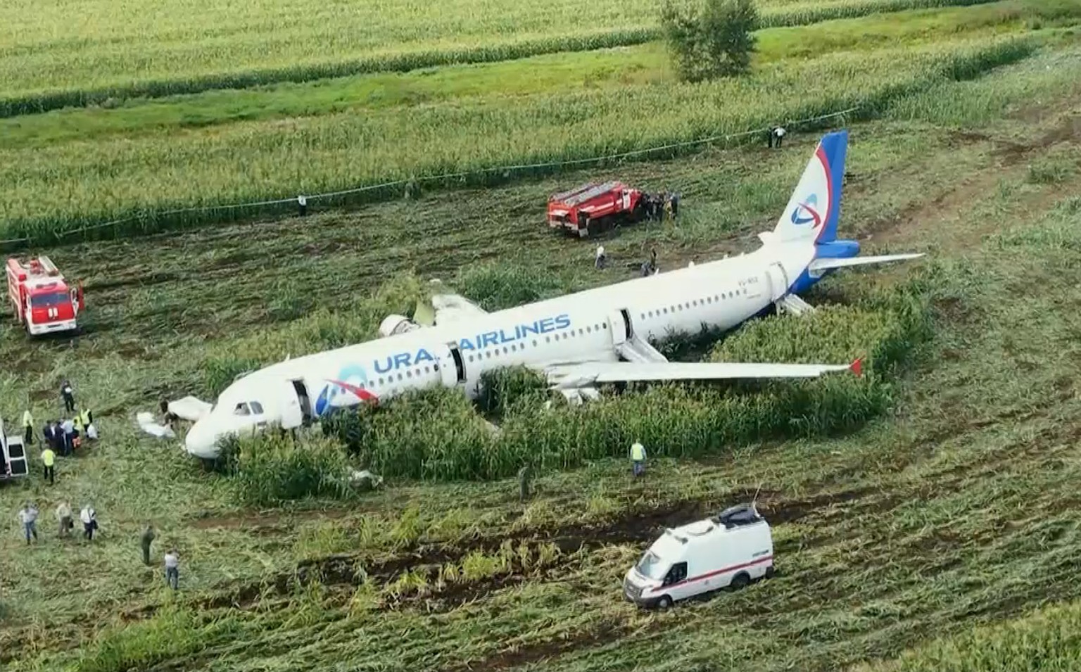 In this video grab provided by the RU-RTR Russian television, a Russian Ural Airlines&#039; A321 plane is seen after an emergency landing in a cornfield near Ramenskoye, outside Moscow, Russia, Thursd ...
