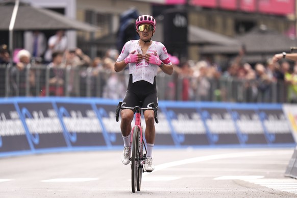 Ecuador&#039;s Richard Carapaz of Ef Education - Easypost Team crosses the finish line in first position to win the stage 11 of the Giro d&#039;Italia cycling race, 186 km from Viareggio to Castelnovo ...