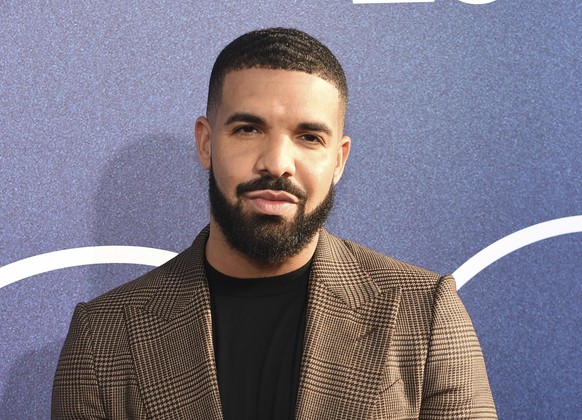 FILE - Drake, an executive producer of the HBO drama series &quot;Euphoria,&quot; poses at the premiere in Los Angeles on June 4, 2019. Drake is the leading nominee for next month?s BET Awards. The Ca ...