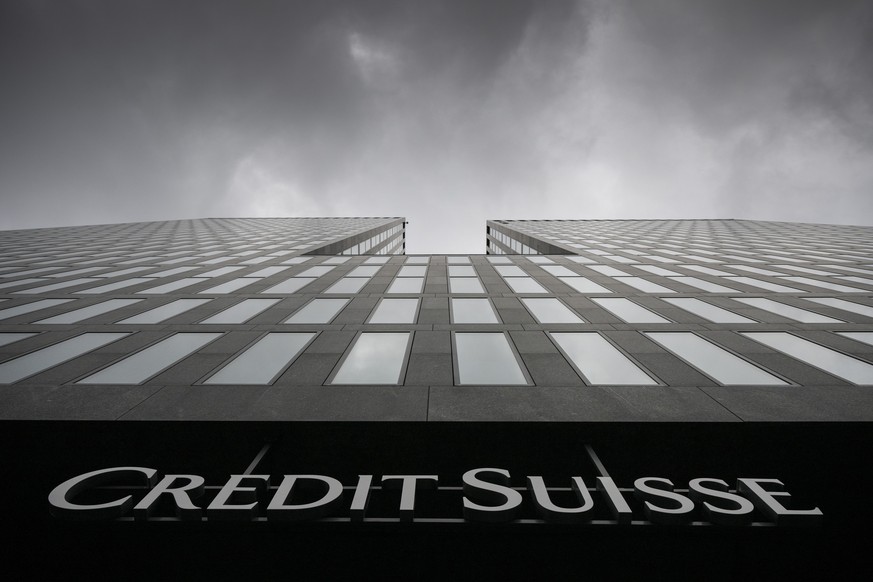 FILE - Grey clouds cover the sky over a building of the Credit Suisse bank in Zurich, Switzerland, Feb. 21, 2022. Credit Suisse has reported a pre-tax loss of more than 1.3 billion Swiss francs, or ab ...