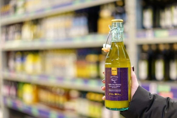 Natives Olivenöl Extra - olio extra vergine.