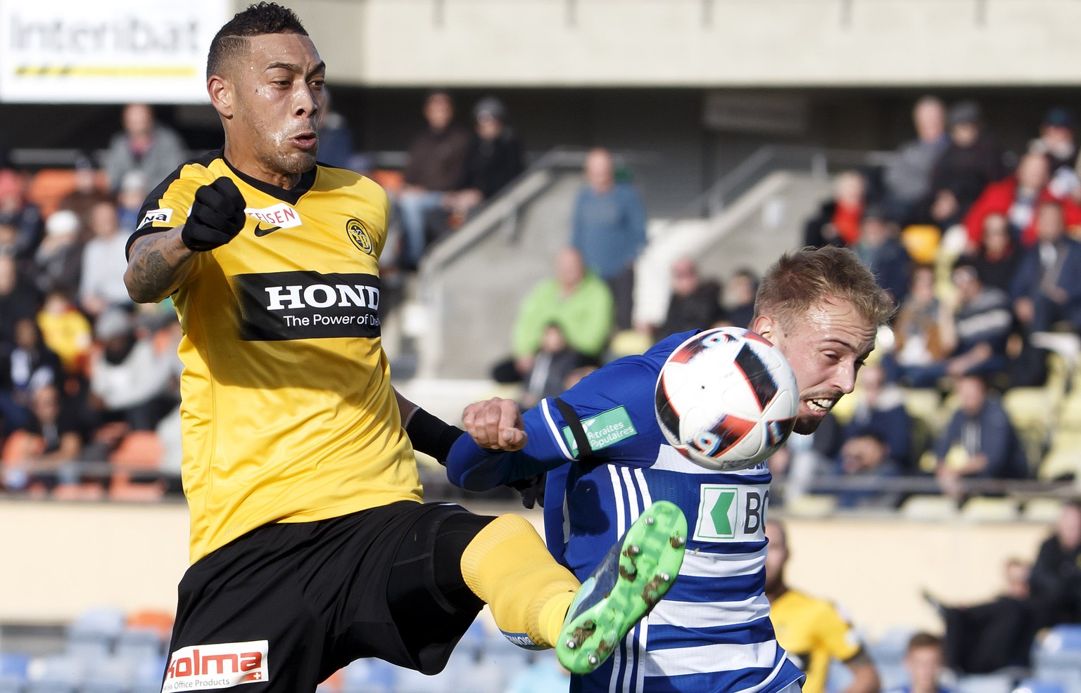 Young Boys&#039; forward Guillaume Hoarau, left, fights for the ball with Lausanne&#039;s defender Nicolas Getaz, right, during the Super League soccer match of Swiss Championship between FC Lausanne- ...