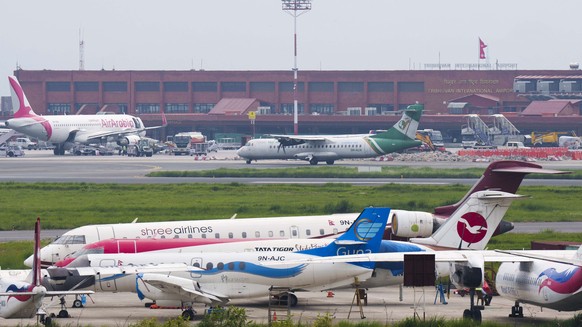 A general view of Tribhuvan International airport in Kathmandu, Nepal, Sunday, May 29, 2022. A small airplane with 22 people on board flying on a popular tourist route was missing in Nepal