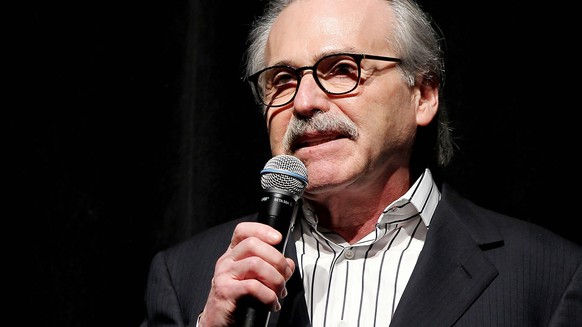 FILE - In this Jan. 31, 2014 photo, David Pecker, Chairman and CEO of American Media, addresses those attending the Shape &amp; Men&#039;s Fitness Super Bowl Party in New York. An attorney for the hea ...