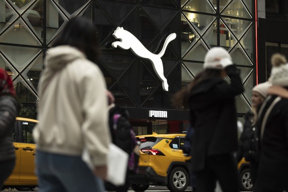 People walk past the Puma store on the 5th Avenue, Monday, April 7, 2025, in New York. (AP Photo/Yuki Iwamura)
US Trump Tariffs