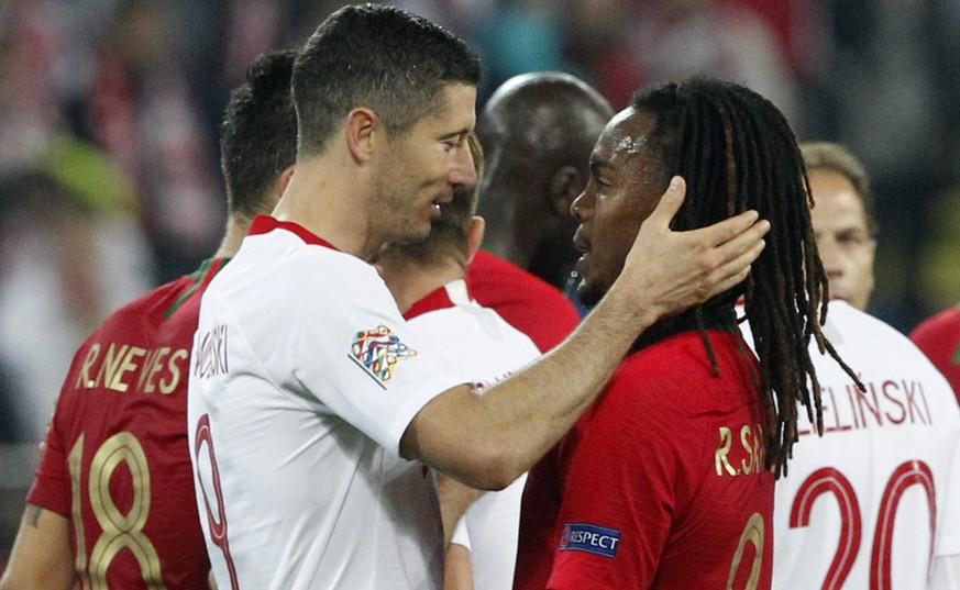 Poland&#039;s Robert Lewandowski, left, hugged Portugal&#039;s Renato Sanches after the UEFA Nations League soccer match between Poland and Portugal at the Silesian Stadium Chorzow, Poland, Thursday O ...