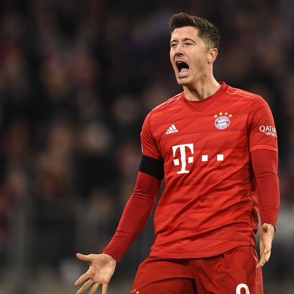 epa08235765 Bayern's Robert Lewandowski celebrates scoring the 2-1 lead during the German Bundesliga soccer match between Bayern Munich and SC Paderborn in Munich, Germany, 21 February 2020. EPA/ ...