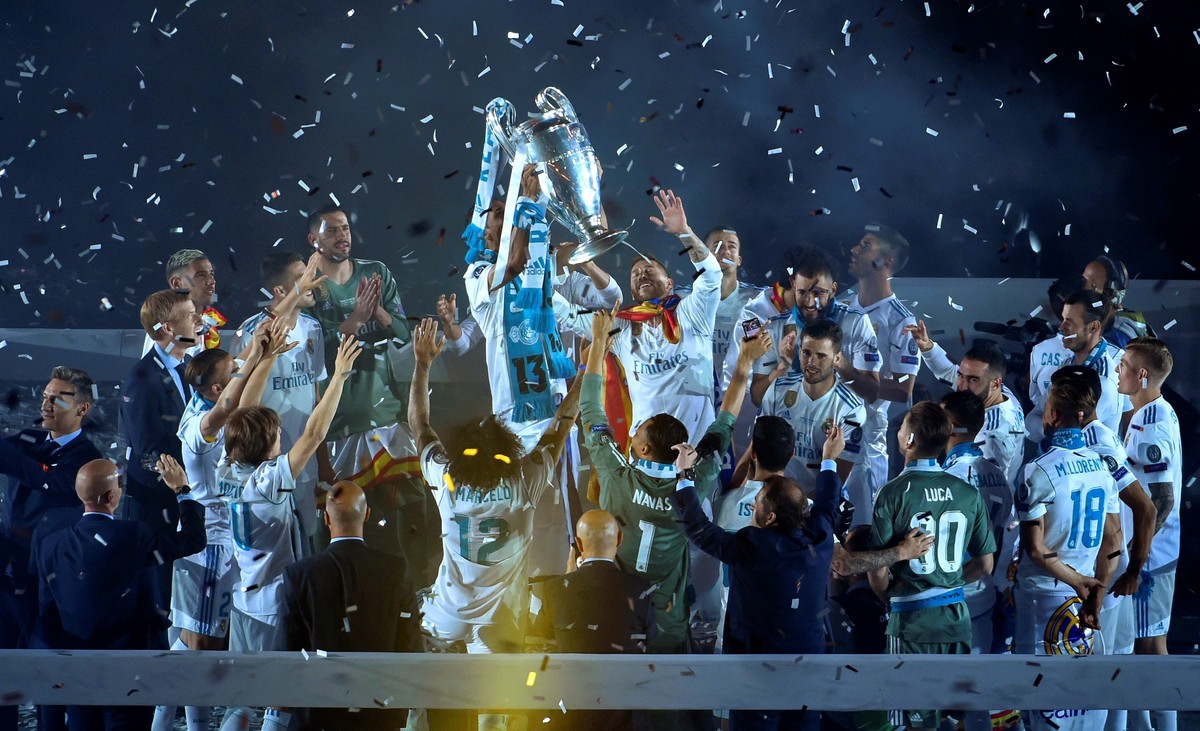 epa06767836 Real Madrid's players celebrate at Santiago Benabeu stadium at UEFA Champions League title in Madrid, Spain, 27 May 2018. Real Madrid defeated 3-1 Liverpool in the UEFA Champions Leag ...