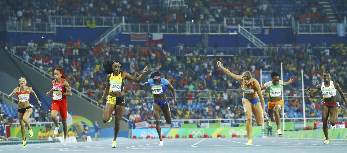 2016 Rio Olympics - Athletics - Final - Women's 200m Final - Olympic Stadium - Rio de Janeiro, Brazil - 17/08/2016. Elaine Thompson (JAM) of Jamaica (3rd L) runs to win the gold, ahead of silver  ...