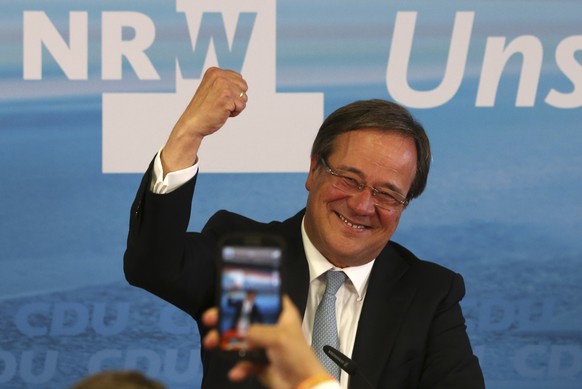 Armin Laschet, top candidate of the Christian Democratic Union, celebrates after the state election in the western German state of Northrhine-Westphalia in Duesseldorf, Germany, Sunday, May 14, 2017.  ...