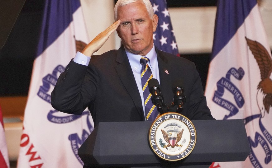 Vice President Mike Pence salutes members of the armed forces during a Make America Great Again event in Carter Lake, Iowa, Thursday, Oct. 1, 2020. (AP Photo/Nati Harnik)
Mike Pence