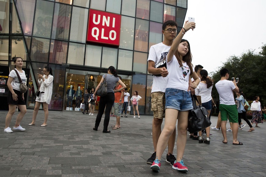 Um die Uniqlo-Filiale in Peking gab es einen derartigen Rummel, dass die Polizei sie abriegelte.