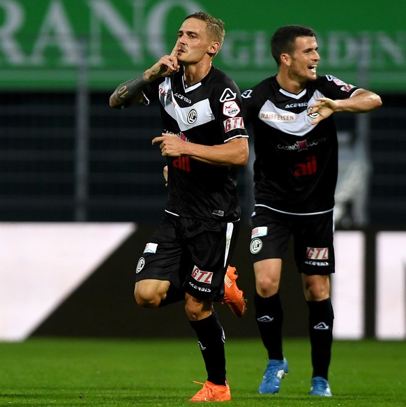 Lugano&#039;s player Mattia Bottani, left, celebrates the 2 - 0 goal with team mates, during the Super League soccer match FC Lugano against FC Luzern, at the Cornaredo stadium in Lugano, Saturday, Se ...