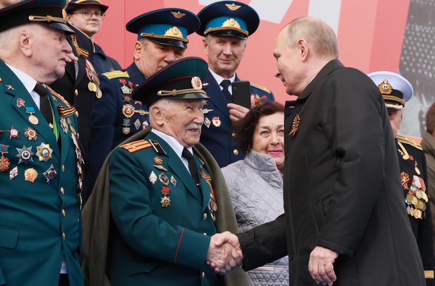 Russian President Vladimir Putin arrives to attend the Victory Day military parade marking the 77th anniversary of the end of World War II in Moscow, Russia, Monday, May 9, 2022. (Mikhail Metzel, Sput ...