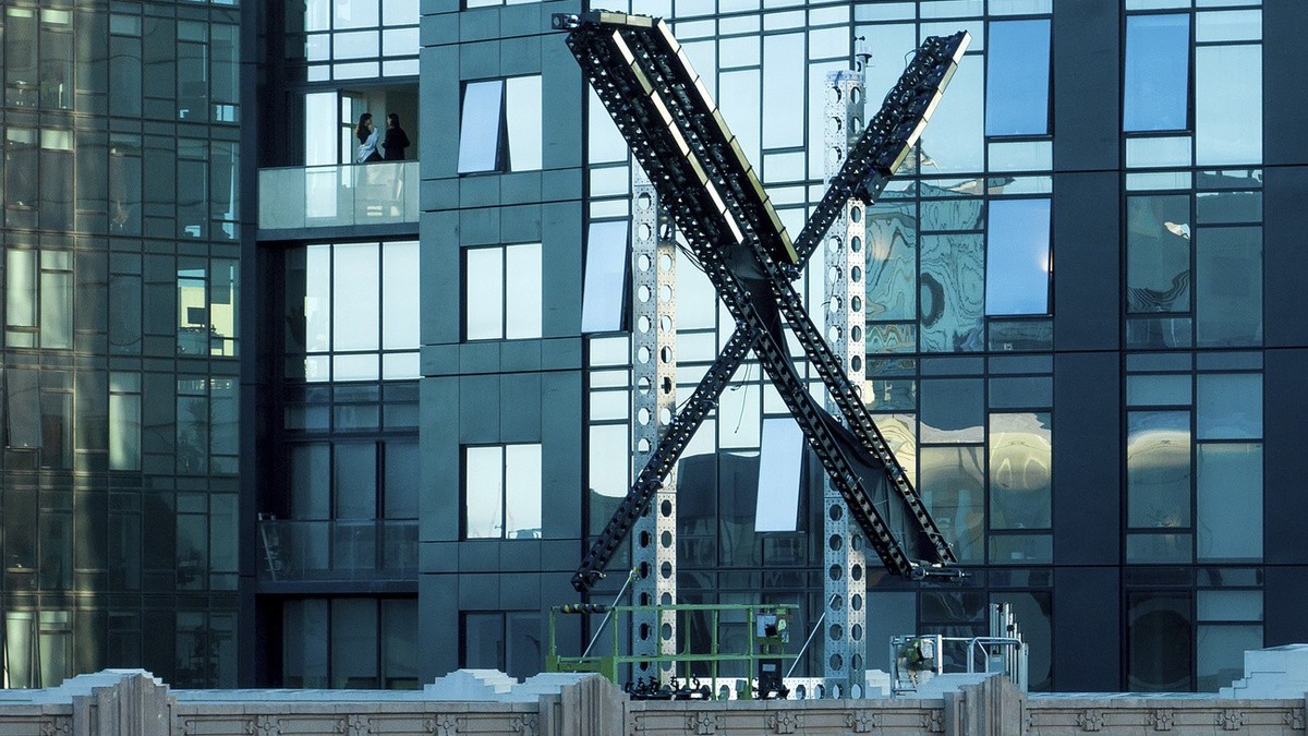 A partially completed "X" sign rests atop the company headquarters, formerly known as Twitter, in downtown San Francisco, on Friday, July 28, 2023. San Francisco has launched an investigatio ...