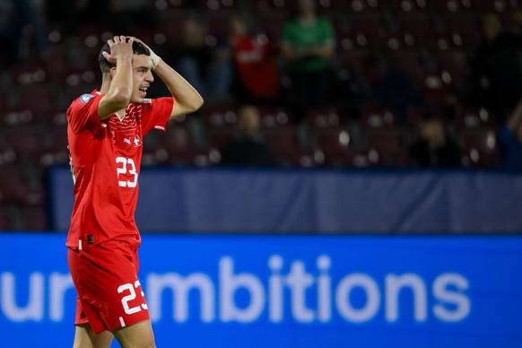 Switzerland&#039;s Zeki Amdouni reacts during a Group D match between Switzerland and France at the 2023 UEFA European Under-21 Championship tournament in the Dr. Constantin Radulescu stadium in Cluj- ...