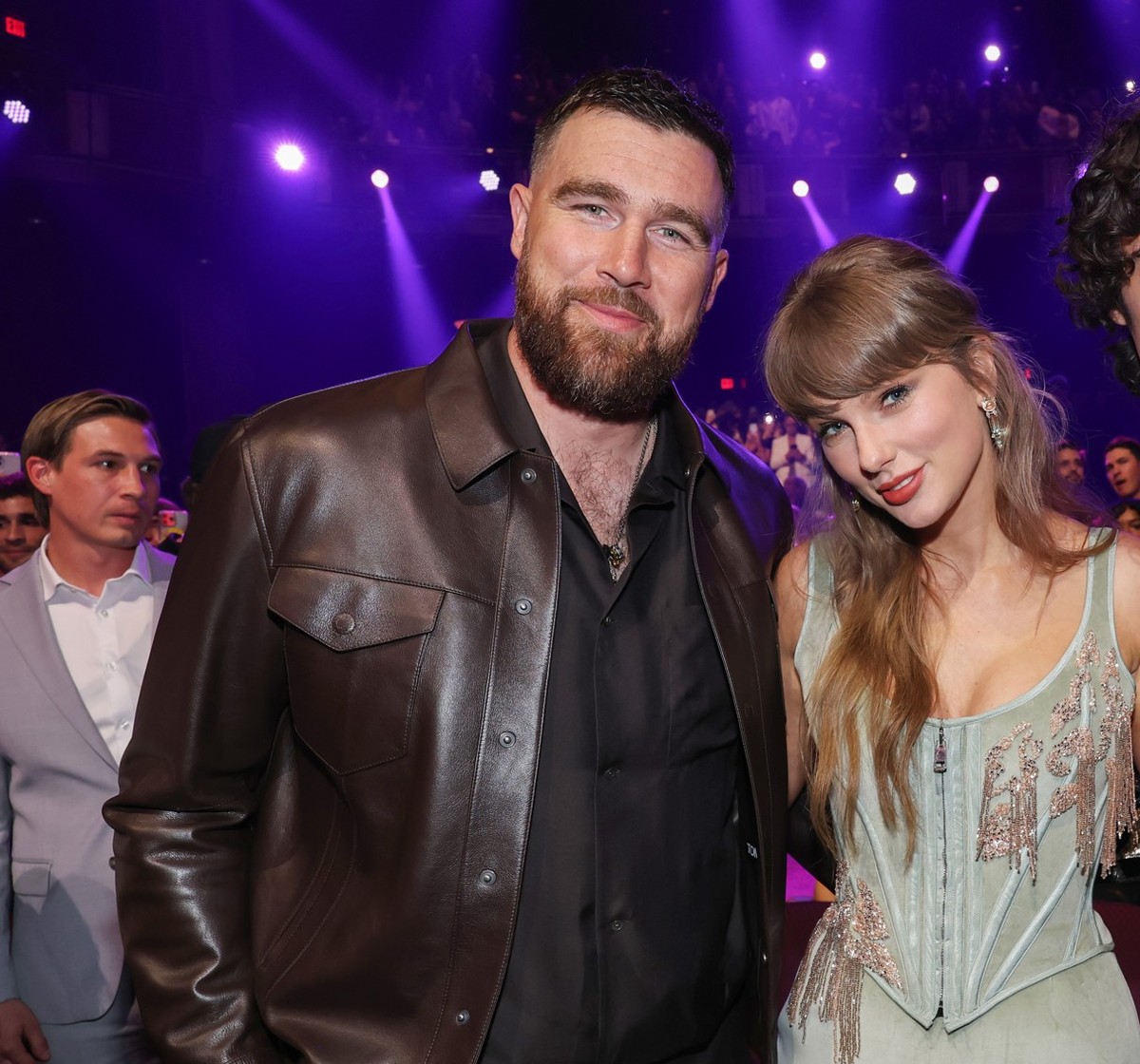 LOS ANGELES, CALIFORNIA - MARCH 26: (FOR EDITORIAL USE ONLY) (L-R) Travis Kelce, Taylor Swift, and sombr attend the 2026 iHeartRadio Music Awards at Dolby Theatre on March 26, 2026 in Los Angeles, Cal ...
