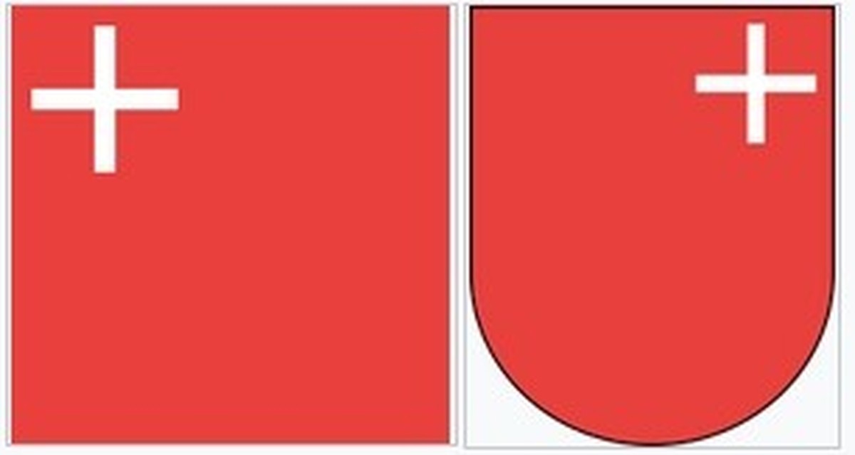 Fahne (Flagge) und Wappen des Kantons (und der Gemeinde) Schwyz.
https://de.wikipedia.org/wiki/Fahne_und_Wappen_des_Kantons_und_der_Gemeinde_Schwyz