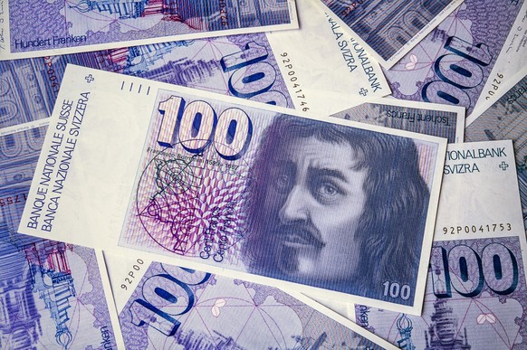 Vorder- und Rueckseite der Schweizer 100-Franken-Note aus der Banknotenserie von 1976, aufgenommen im Juni 1993. Auf der Vorderseite ist das Abbild von Francesco Borromini sichtbar. (KEYSTONE/Martin R ...