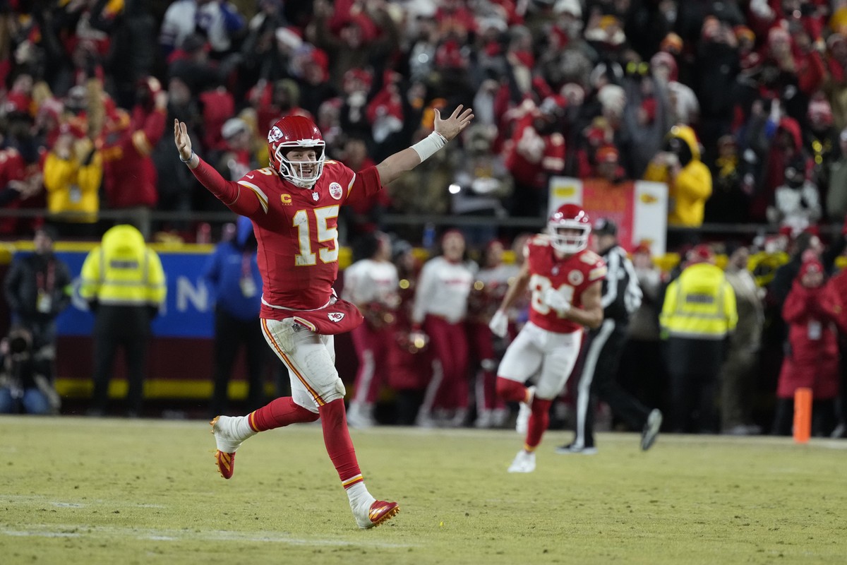 Kansas City Chiefs quarterback Patrick Mahomes (15) celebrates after defeating the Buffalo Bills in the AFC Championship NFL football game, Sunday, Jan. 26, 2025, in Kansas City, Mo. (AP Photo/Ed Zurg ...