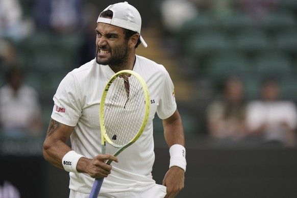 Italy&#039;s Matteo Berrettini celebrates winning a point from Germany&#039;s Alexander Zverev during the men&#039;s singles match on day six of the Wimbledon tennis championships in London, Saturday, ...
