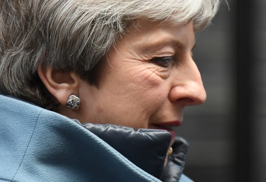 epa07462594 British Prime Minister, Theresa May leaves 10 Downing street to give a statement in the Houses of Parliament in London, Britain, 25 March 2019. Reports state that Theresa May updated minis ...