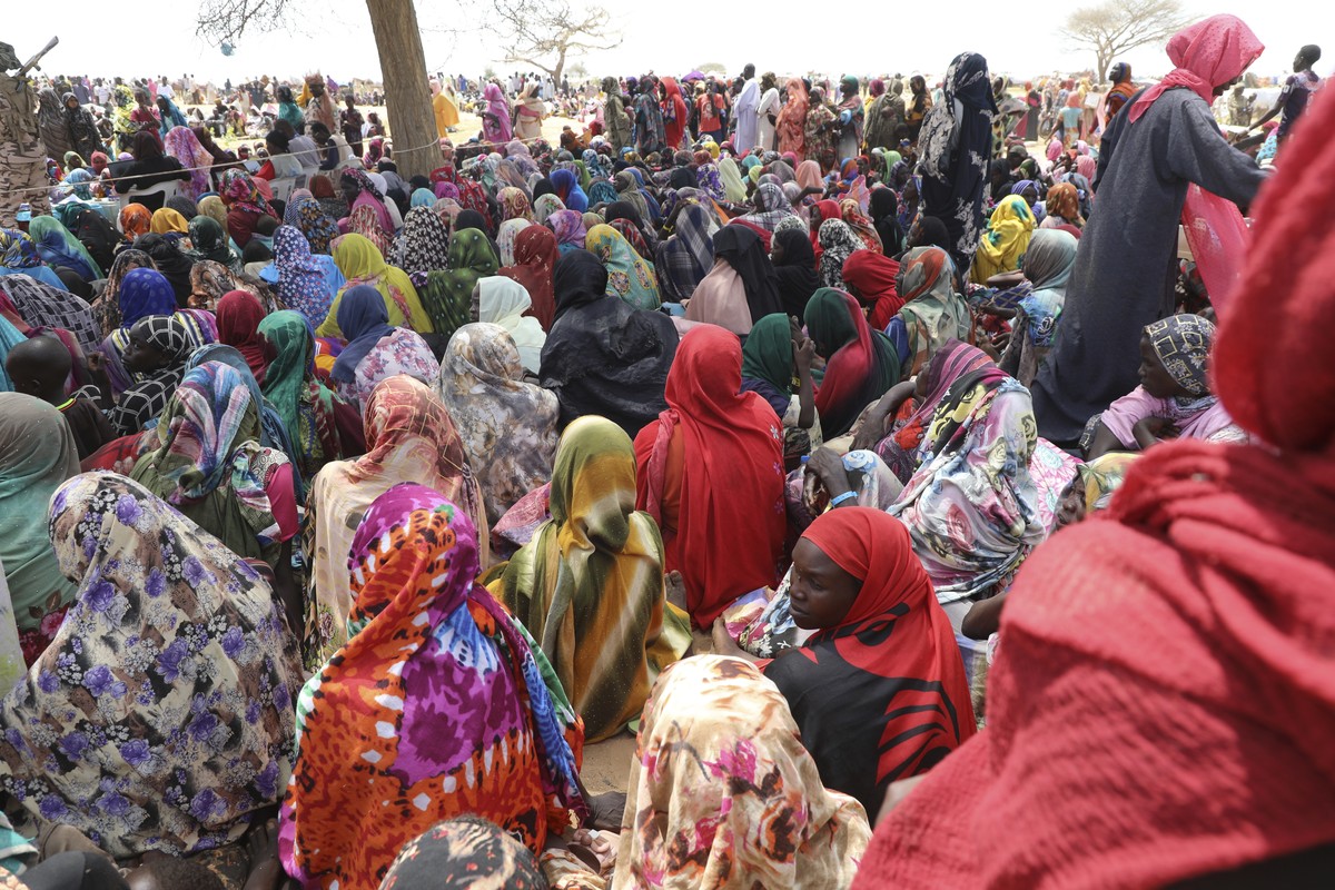Sudanese refugees who fled the conflict in Sudan gather July 1, 2023 at the Zabout refugee Camp in Goz Beida, Chad. The U.N. says the conflict in Sudan has driven more than 3.1 million people from the ...