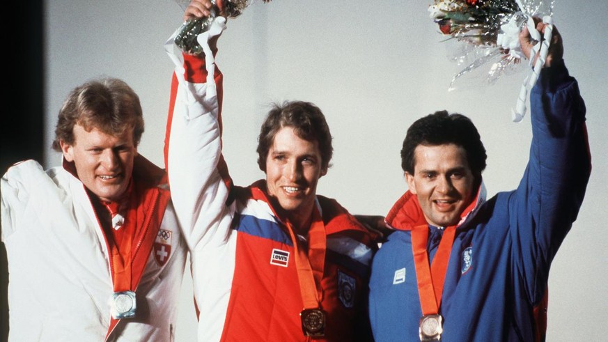 Nur Silber für Müller: Johnson wird Olympiasieger 1984, Bronze geht an den Österreicher Steiner (rechts).