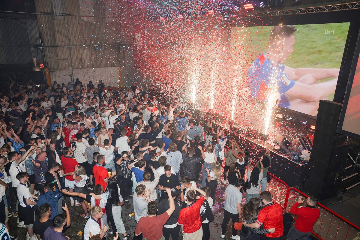 Fans watching England v Slovakia - EUFA Euro 2024 England fans celebrate at full-time at the Diecast, Manchester, during a screening of the UEFA EURO, EM, Europameisterschaft,Fussball 2024, round of 1 ...