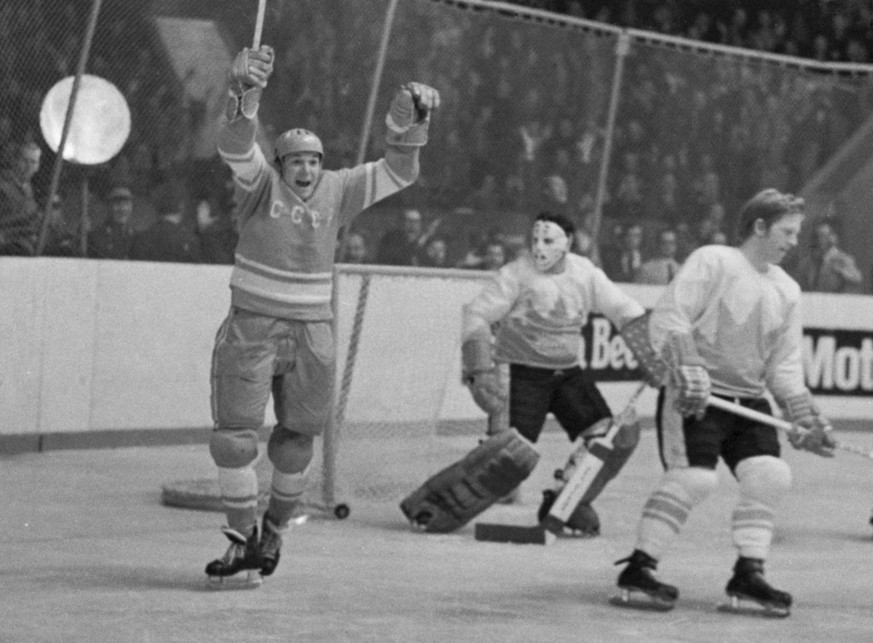 Moscow, USSR. Soviet forward Alexander Maltsev L reacts as Canadian goaltender Tony Esposito R has conceded a goal during the fifth game of the 1972 Canada USSR Summit Series at the Palace of Sports o ...