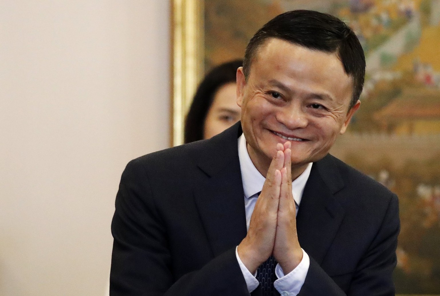 epa06678630 Jack Ma, founder of Chinese e-commerce giant Alibaba, gestures as he arrives for a meeting with Thailand&#039;s Prime Minister Prayut Chan-o-cha (not pictured) in Bangkok, Thailand, 19 Apr ...