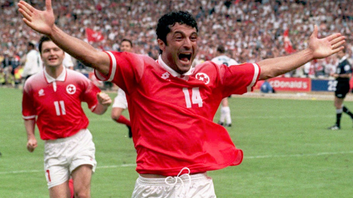 Switzerland's Kubilay Tuerkyilmaz celebrates after scoring from a penalty to equalize in the final minutes of the Saturday, June 8, 1996, opening Euro 96 Championship match against England, at We ...