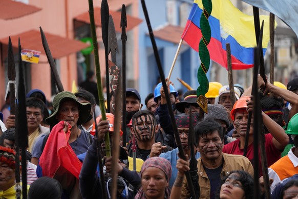 Indigenous protesters march to the Basilica del Voto Nacional where they expect dialogue with the government to take place in downtown Quito, Ecuador, Monday, June 27, 2022. Ecuadorian President Guill ...