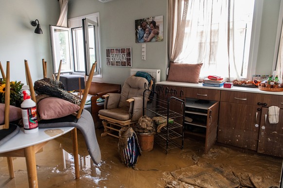 epa10848301 Furniture is seen inside a damaged house full of mud, in the coastal port city of Volos, in Magnesia regional unit, Thessaly region, after storm &#039;Daniel&#039; swept across central Gre ...