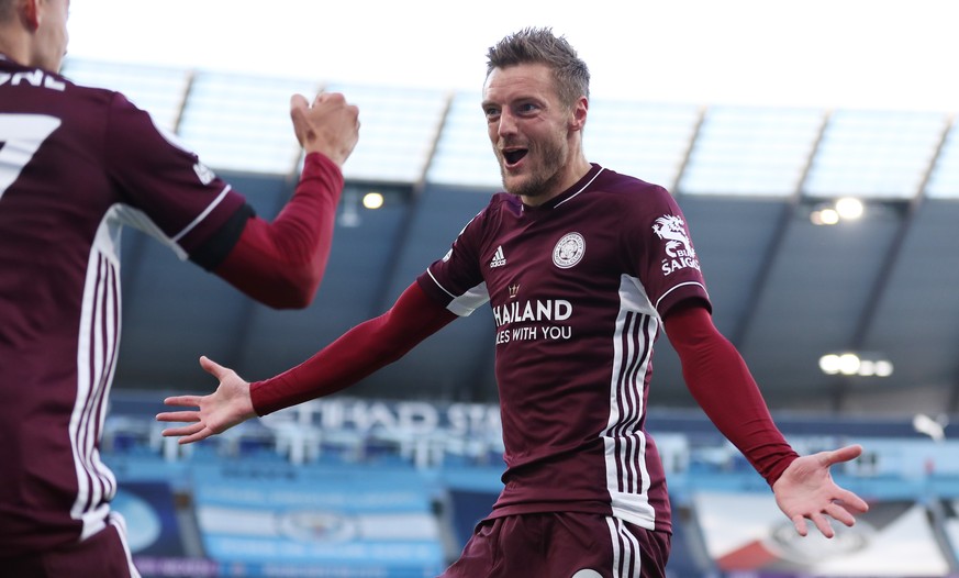 epa08702065 Jamie Vardy (R) of Leicester celebrates after scoring his second goal during the English Premier League match between Manchester City and Leicester City in Manchester, Britain, 27 Septembe ...