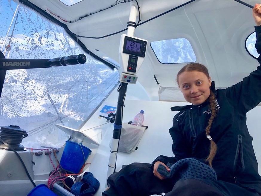 epa07792078 A handout photo made available by Swedish climate activist Greta Thunberg&#039;s twitter account shows her onboard the racing boat Malizia II in the Atlantic Ocean, 24 August 2019 (issued  ...