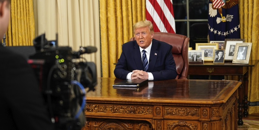 President Donald Trump speaks in an address to the nation from the Oval Office at the White House about the coronavirus Wednesday, March, 11, 2020, in Washington. (Doug Mills/The New York Times via AP ...