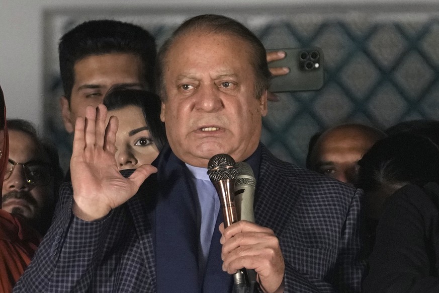 Pakistan's Former Prime Minister Nawaz Sharif addresses supporters following initial results of the country's parliamentary election, in Lahore, Pakistan, Friday, Feb. 9, 2024. Sharif is cha ...