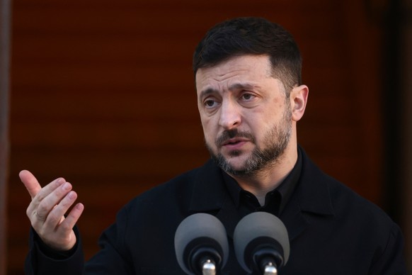 Ukraine President Volodymyr Zelenskyy gestures while speaking as he takes part in a joint news conference with the Irish Taoiseach Micheal Martin in Dublin, Ireland, Tuesday, Dec. 2, 2025. (AP Photo/P ...
