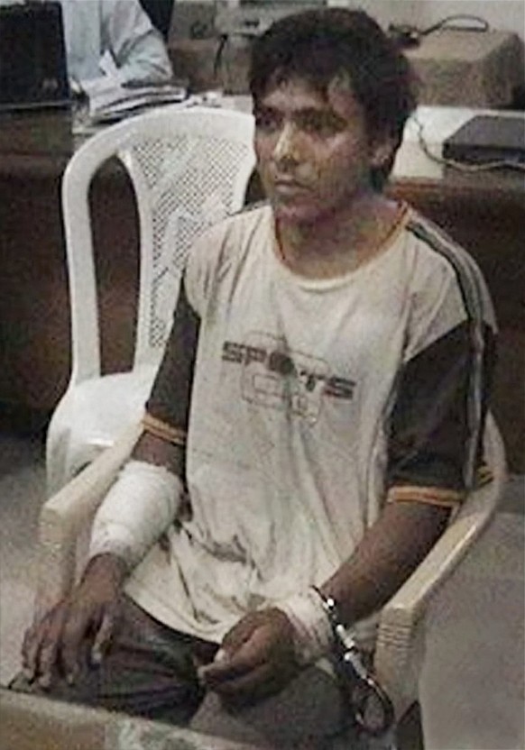 FILE - This undated file photo shows Pakistani man Mohammed Ajmal Kasab, the lone survivor among 10 gunmen of the 2008 Mumbai terror attack, in Mumbai, India. India executed Ajmal Kasab from the 2008  ...