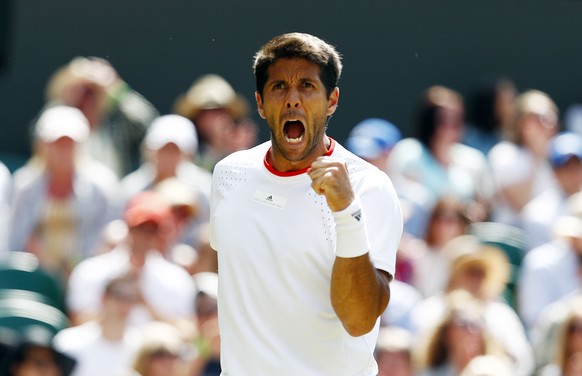 epa07692153 Fernando Verdasco of Spain scores a winner against Kyle Edmund of Britain in their second round match during the Wimbledon Championships at the All England Lawn Tennis Club, in London, Bri ...