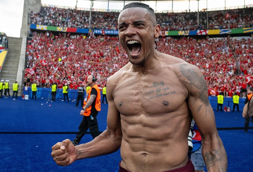 BERLIN, GERMANY - JUNE 29: Manuel Akanji of Switzerland celebrates after wining the match between Switzerland and Italy on Round of 16 - UEFA EURO, EM, Europameisterschaft,Fussball 2024 at Olympiastad ...