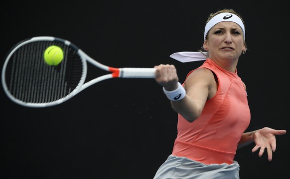 Switzerland&#039;s Timea Bacsinszky makes a forehand return to Russia&#039;s Daria Kasatkina during their first round match at the Australian Open tennis championships in Melbourne, Australia, Tuesday ...