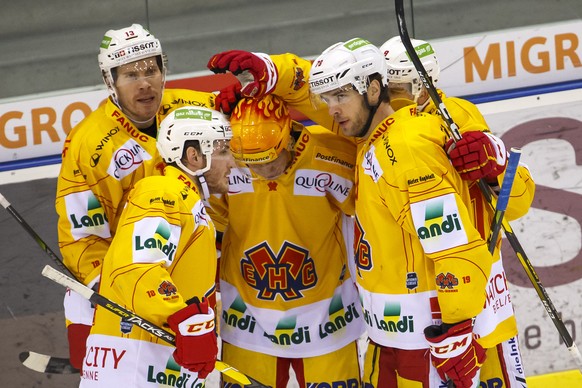 Biel&#039;s forward Toni Rajala, of Finland, center, celebrates his goal with teammates defender Anssi Salmela, of Finland, left, defender Kevin Fey, 2nd left, forward Marc-Antoine Pouliot, of Canada, ...