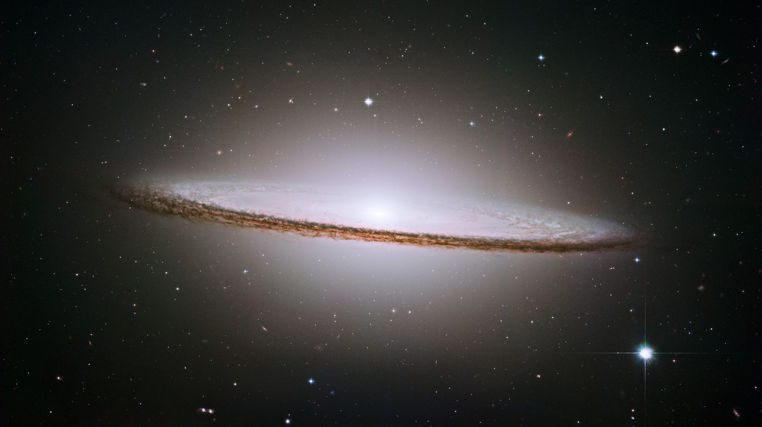 NASA/ESA Hubble Space Telescope has trained its razor-sharp eye on one of the universe&#039;s most stately and photogenic galaxies, the Sombrero galaxy, Messier 104 (M104). The galaxy&#039;s hallmark  ...