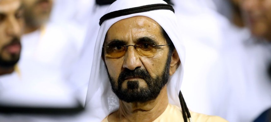 DUBAI, UNITED ARAB EMIRATES - MARCH 30: Sheikh Mohammed bin Rashid Al Maktoum (L), Vice President and Prime Minister of the UAE and Ruler of Dubai looks on during the Dubai World Cup at Meydan Racecou ...