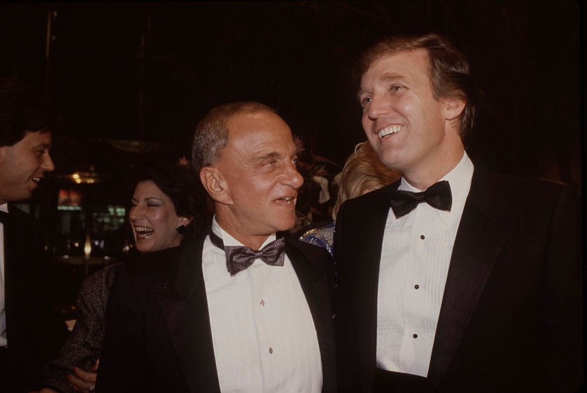 NEW YORK, NY - 1983: Roy Cohn (L) and Donald Trump attend the Trump Tower opening in October 1983 at The Trump Tower in New York City. (Photo by Sonia Moskowitz/Getty Images)