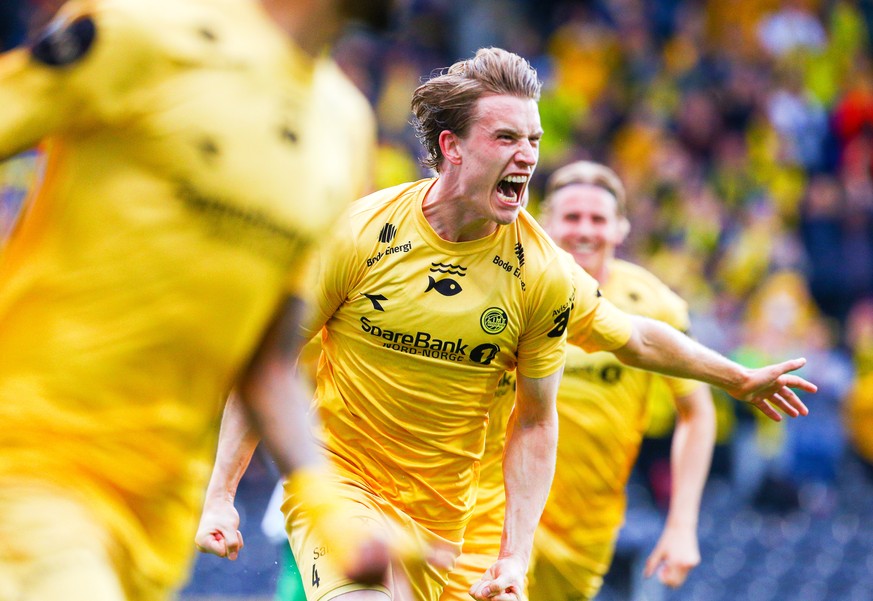epa10104377 Bodo&#039;s Marius Hoibraten (C) celebrates with teammates after scoring the 4-0 lead during the UEFA Champions League third qualifying round, first leg soccer match between FK Bodo/Glimt  ...