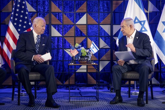 FILE - U.S. President Joe Biden, left, meets with Israeli Prime Minister Benjamin Netanyahu, right, to discuss the the war between Israel and Hamas, in Tel Aviv, Israel, on Oct. 18, 2023. U.S. and Mid ...